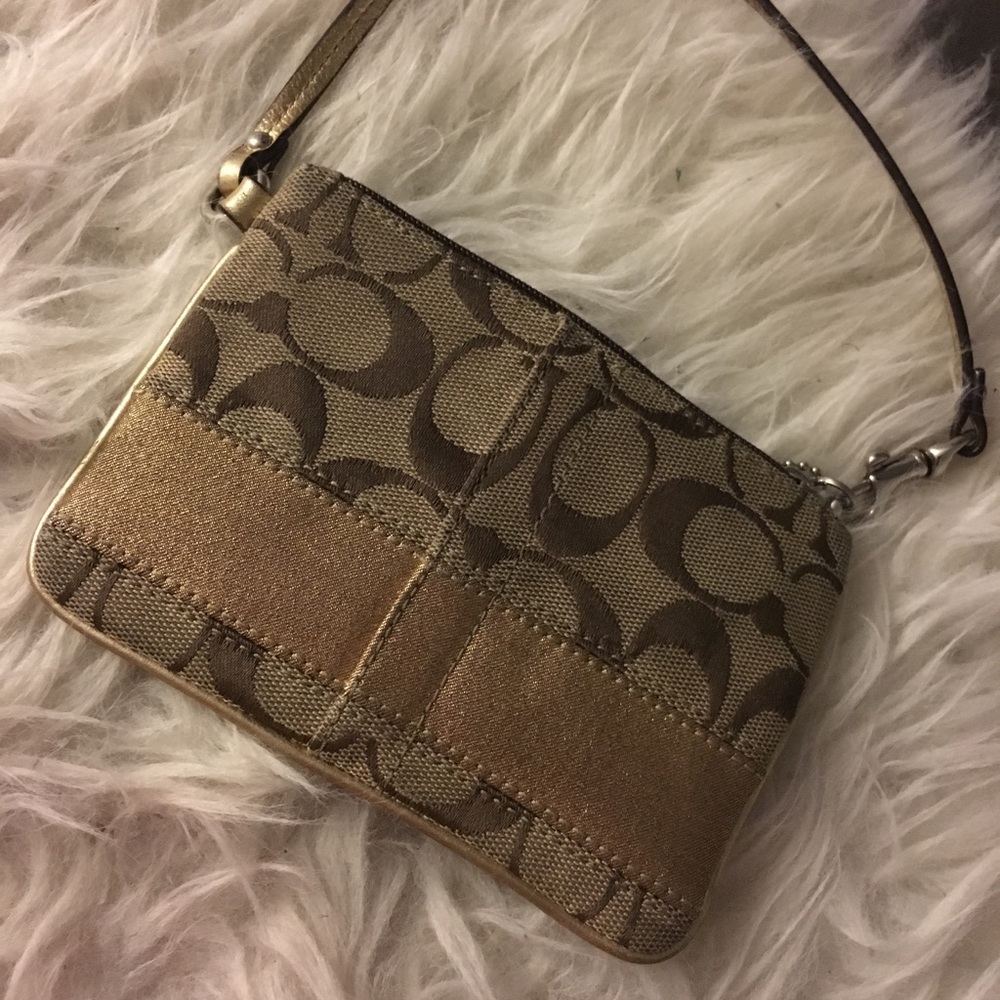 Tan and brown coach wristlet